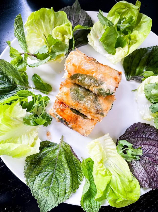 Nem-de-Hanoi.-Red-prawns-Red-prawns-chicken-farce-thai-basil-papaya-lettuce-herbs-nuoc-mam-fish-sauce.-20€_c_The-Duc-Ngo-scaled-e1651222671920