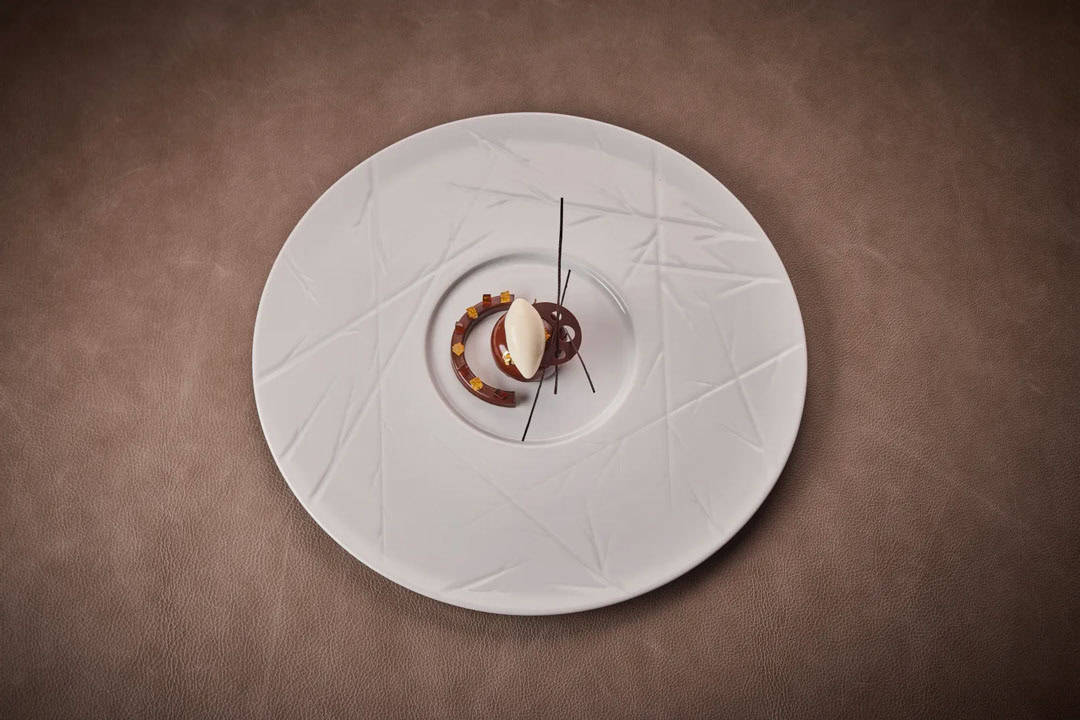 teller-mit-gerichten-schokolade-kaffee-guinness-zitronengras