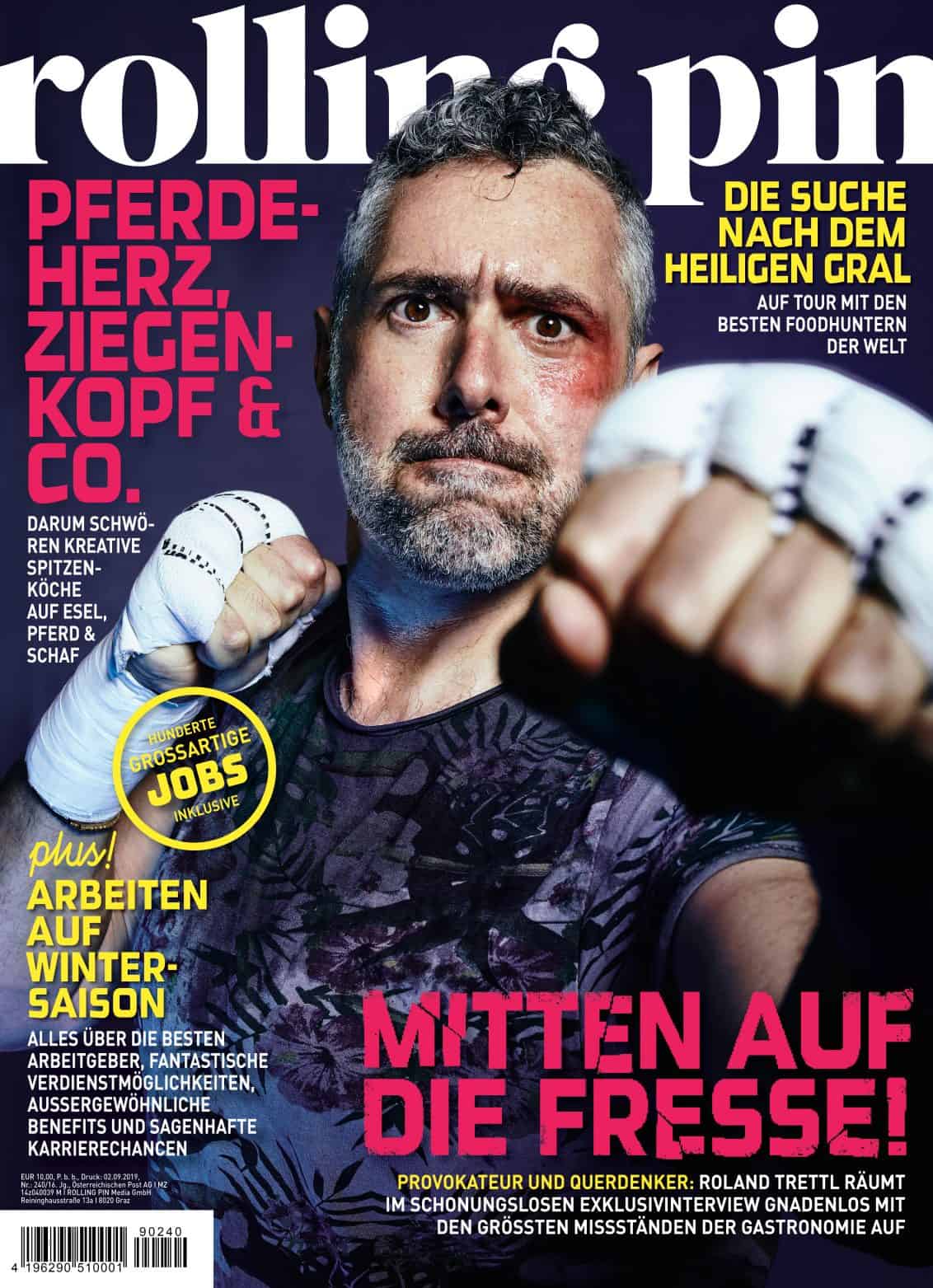 Roland Trettl mit ernstem Blick, blauem Auge und Box-Outfit am Cover des Magazins Rolling Pin