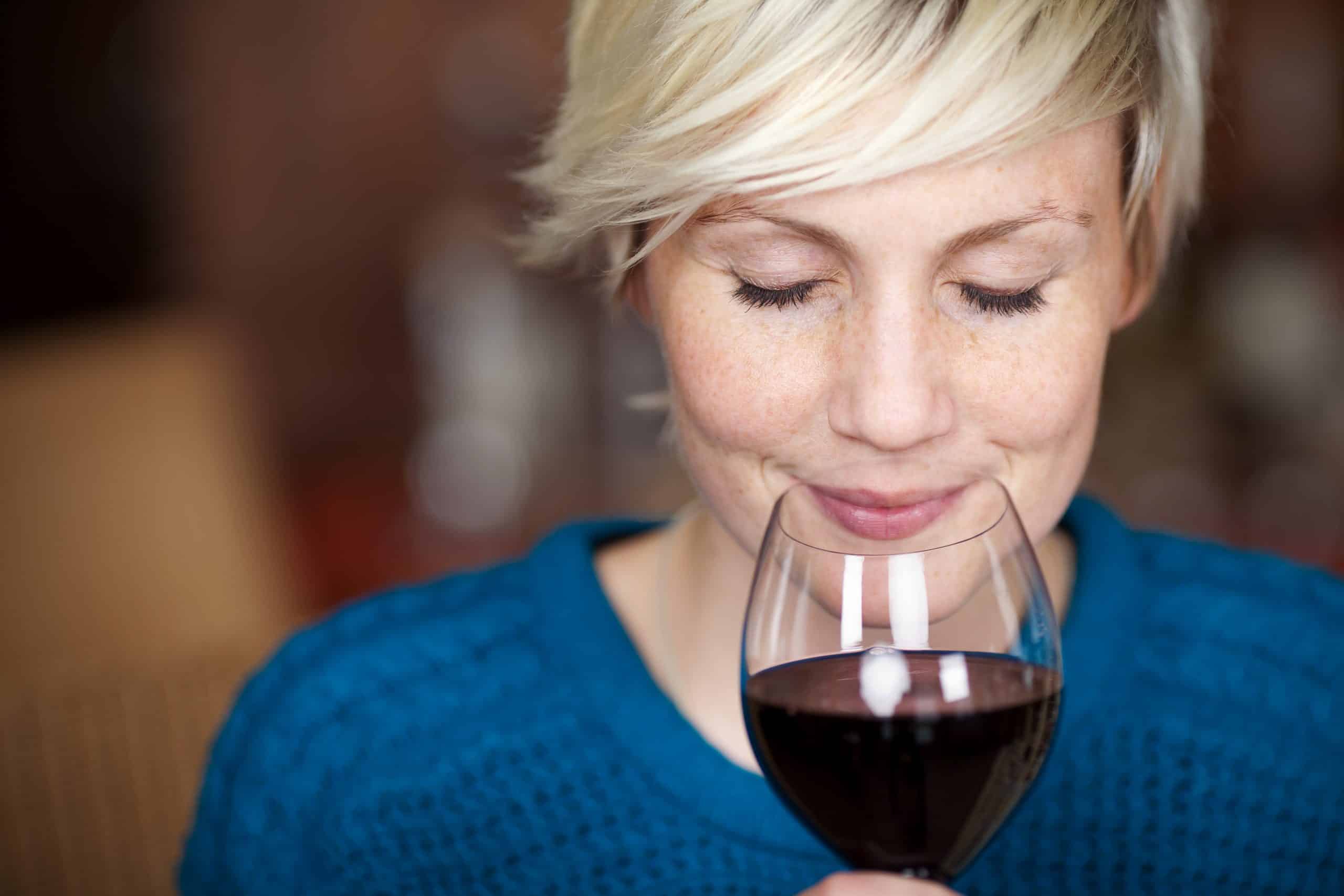 Closeup,Portrait,Of,Young,Female,Customer,Drinking,Red,Wine,With